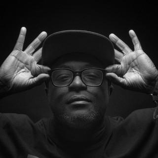 T.