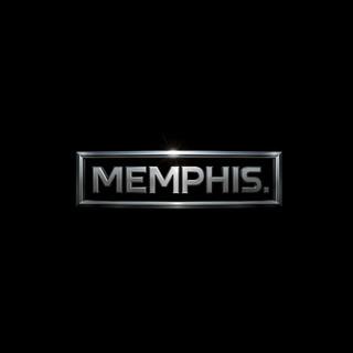 M.